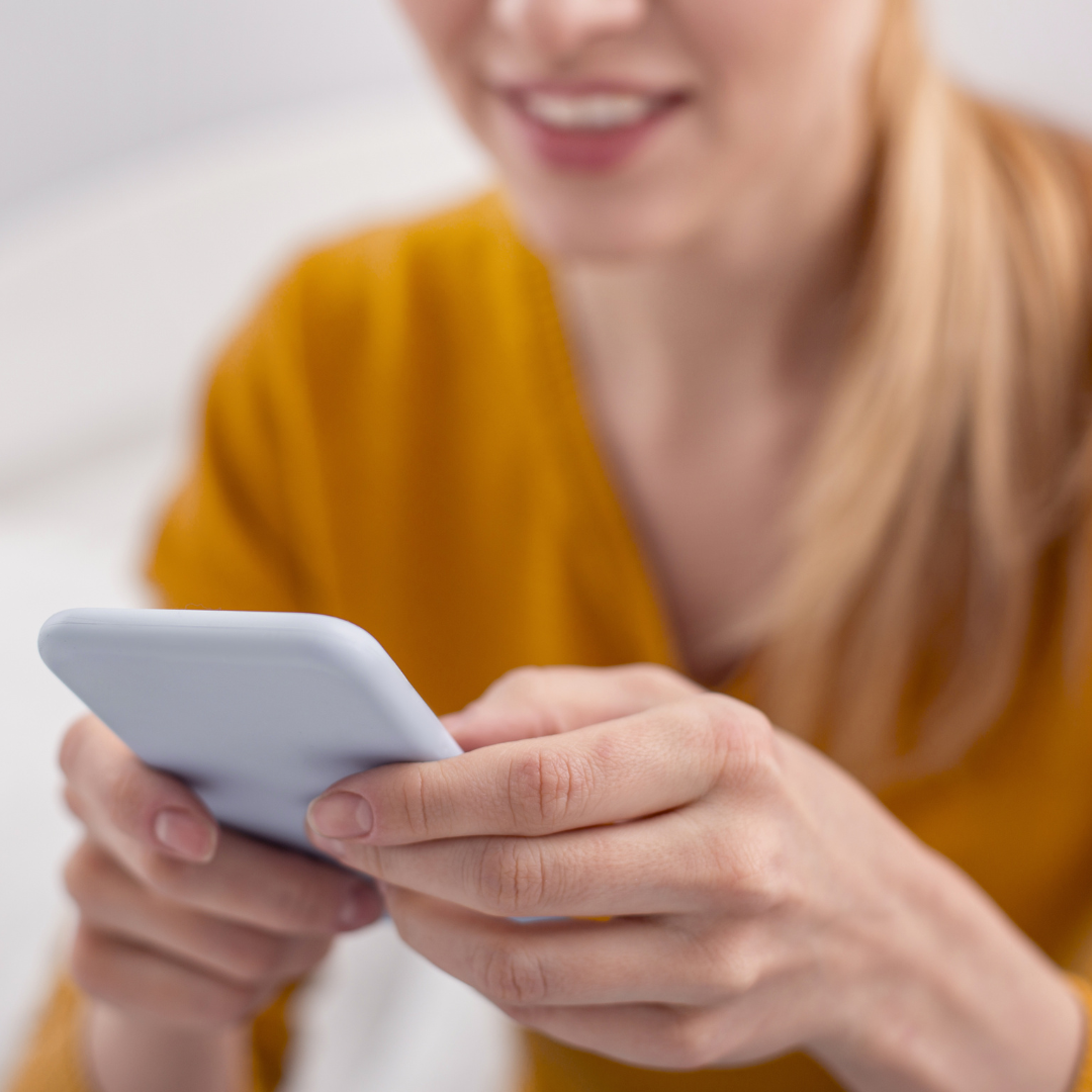 lady holding a phone